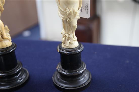 A pair of 19th century Dieppe ivory carvings of muses, Overall H. 12.25in.